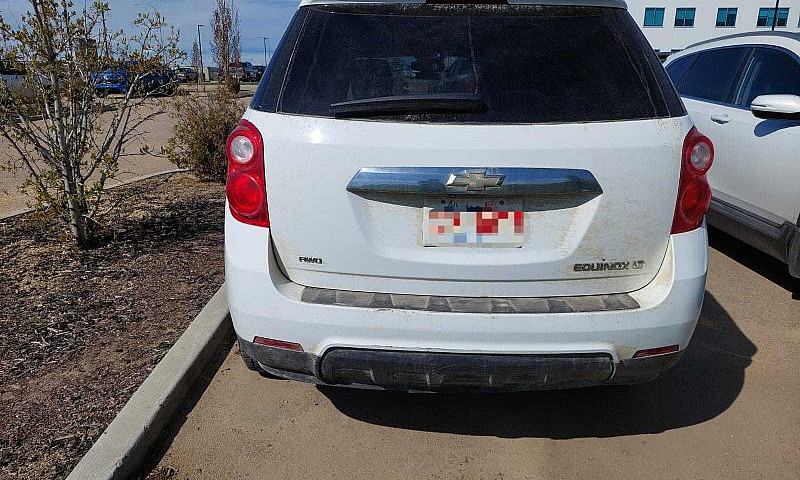 White Chevrolet Equi...