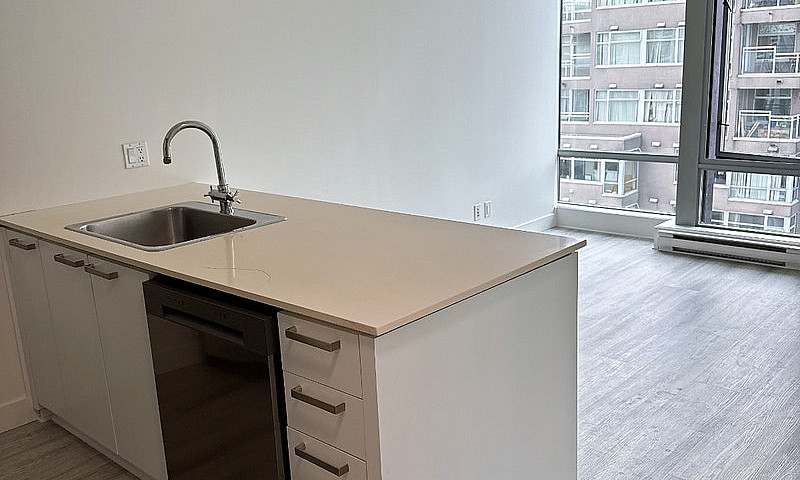 1-Bedroom + Den In Y...