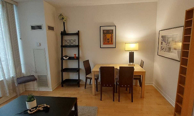 Bachelor + Den Condo...