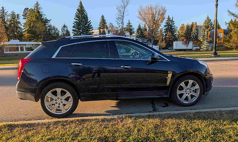 2011 Cadillac Srx 2....