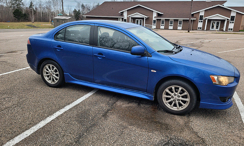 2010 Mitsubishi  Lan...