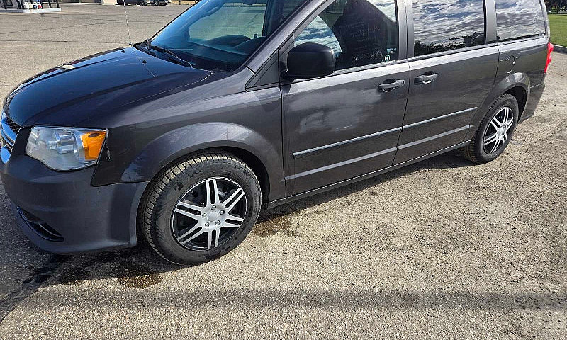 2017 Dodge Caravan 1...