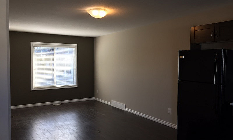 2 Bedroom + Den Town...