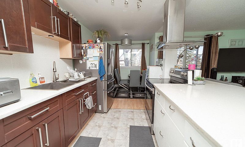#48 11245 31 Av Nw E...