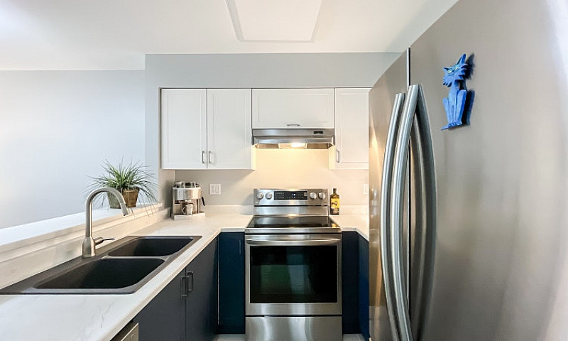 Top-Floor Condo With...