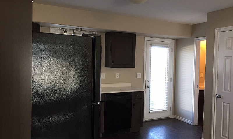 2 Bedroom + Den Town...