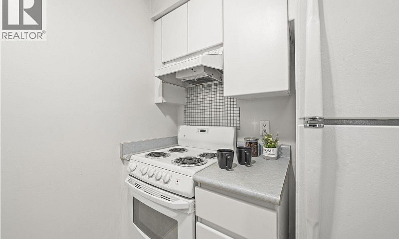 406 3489 Ascot Place...