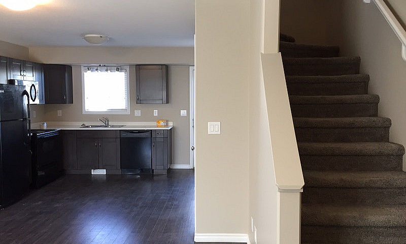 2 Bedroom + Den Town...
