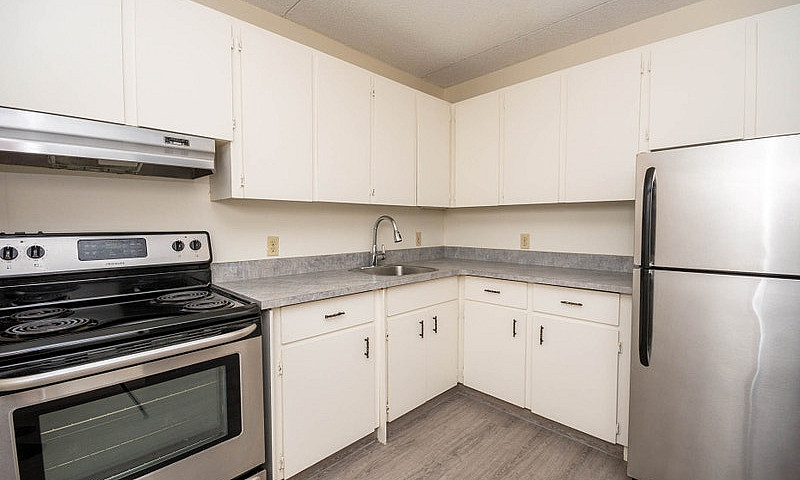 1 Bedroom + Den Prem...