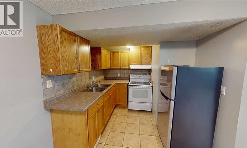 B, 9835 100A Avenue ...