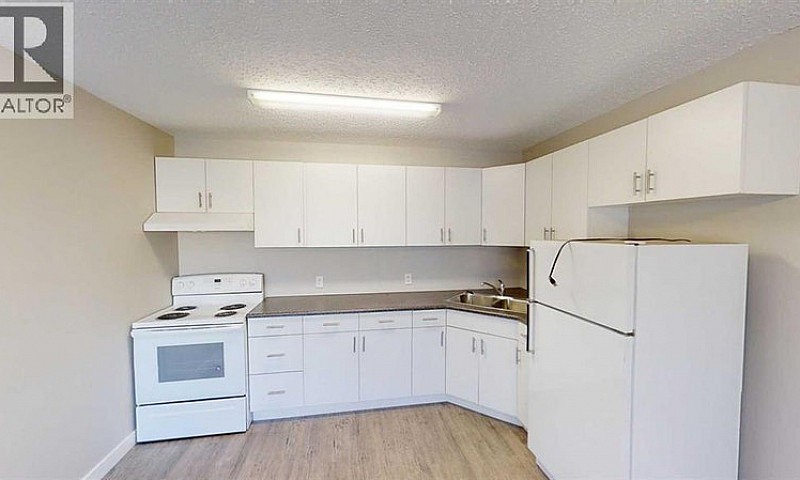 306, 9932 105 Avenue...