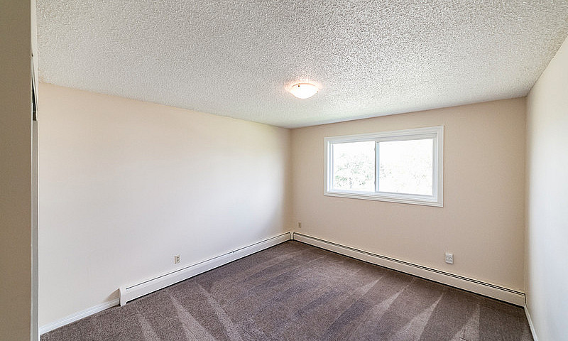 2 Bedroom Bi-Level -...