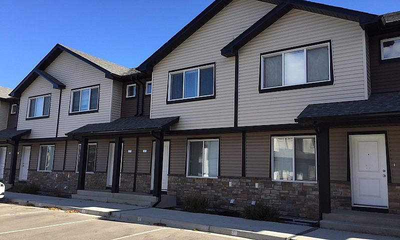 2 Bedroom + Den Town...