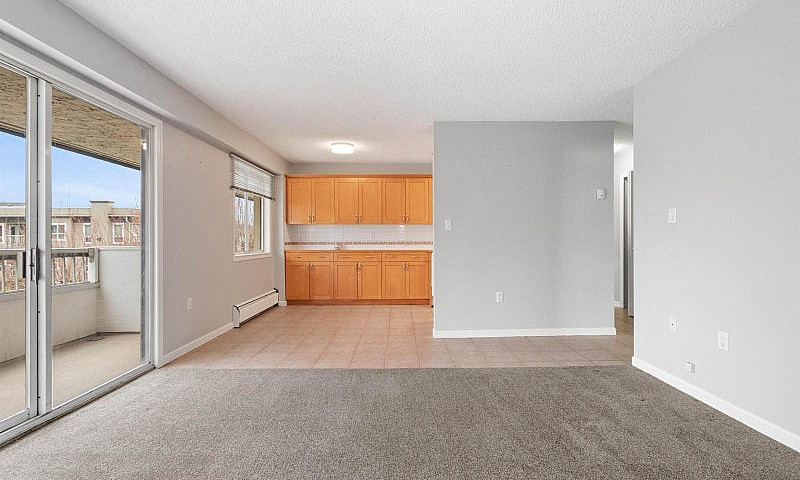 302 9477 Cook Street...
