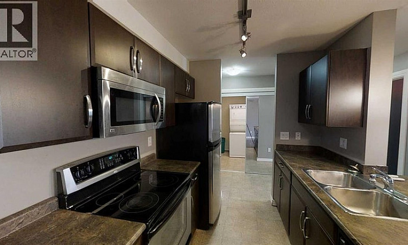 9120 96 Avenue Grand...