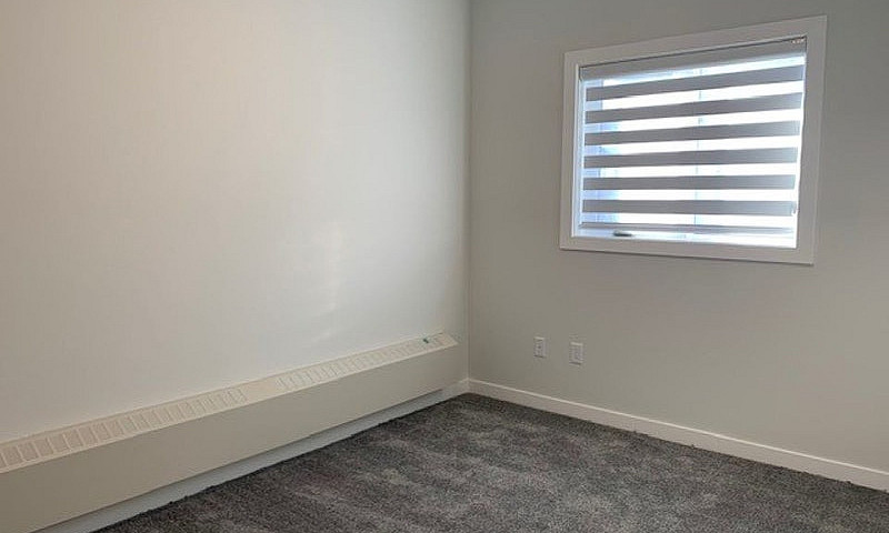 4506 47A Ave - 303 A...