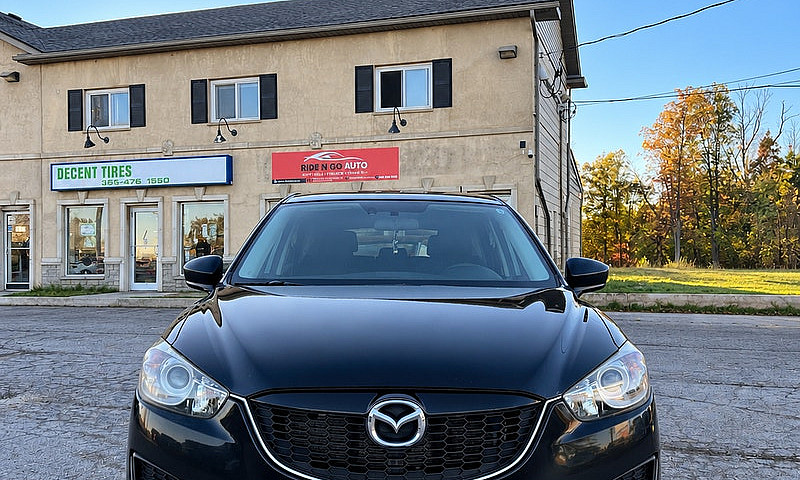 2014 Mazda Cx-5...