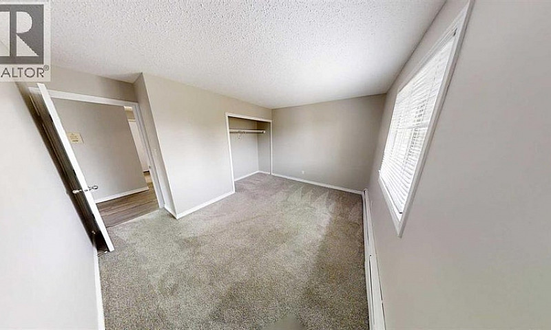 21, 10028 105 Avenue...