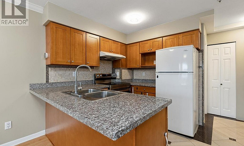 402 6963 Victoria Dr...