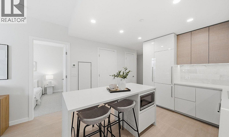 1207 2186 Gilmore Av...