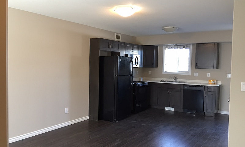 2 Bedroom + Den Town...