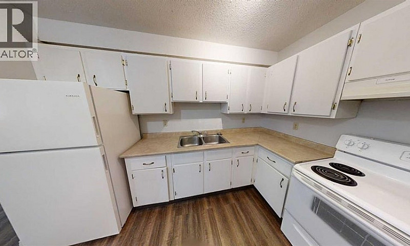 210, 5117 44 Street ...