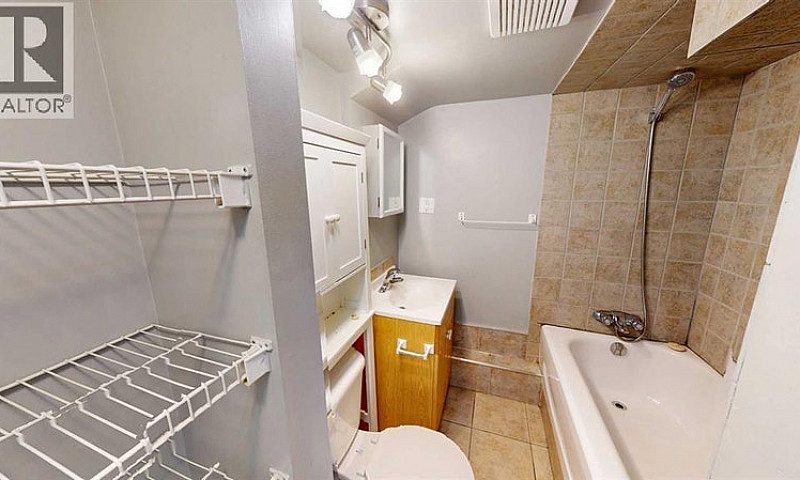 B, 9835 100A Avenue ...