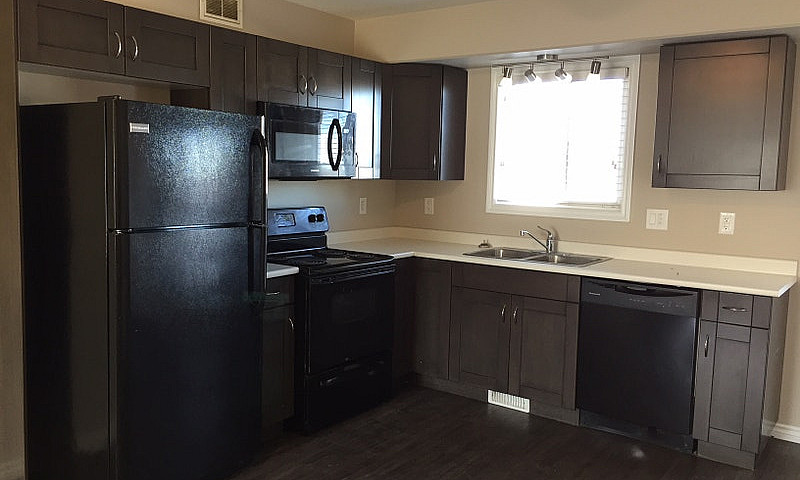 2 Bedroom + Den Town...