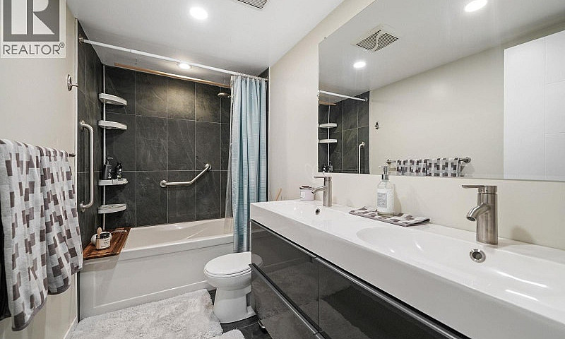 201 444 E 6Th Avenue...