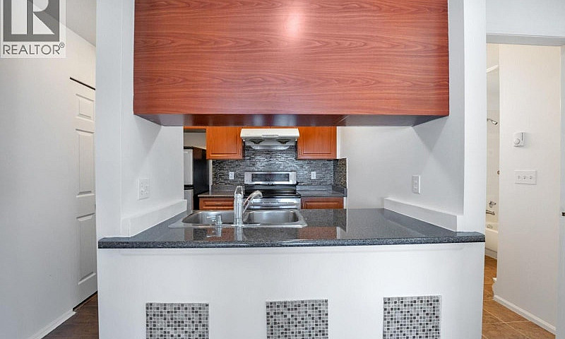 12 1328 W 73Rd Avenu...