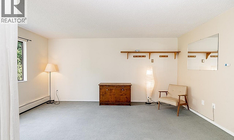 302 830 E. 7Th Avenu...