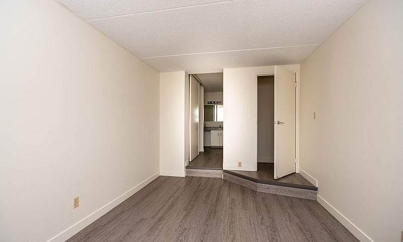 1 Bedroom + Den Prem...