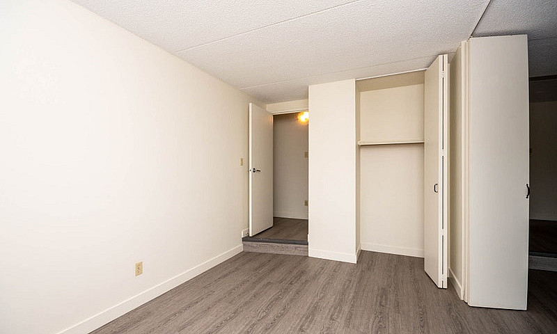 1 Bedroom + Den Prem...