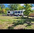 3.8 Acres Waterfront Off Grid 