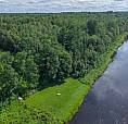 Welcome To This Waterfront Log Home Income Property!