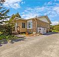 Charming 2+1 Bdrm  Home On A Private, Spacious Lot