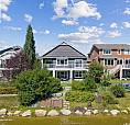 Executive Walkout Bungalow On The Water!