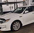 2018 Kia Optima Lx+ — White.  Low Milage; 74000 Km. Certified