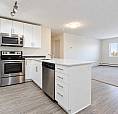 Spacious 2 Bed + 1 Bath Condo | 2 Parking Spots | Skyview Ranch