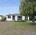 Spacious 3 Bedroom Upper Suite With Private Garage & Workshop In