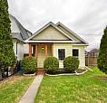 1 1/2 Storey Home W/ An Oversized Garage In River Heights