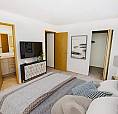 Comfortable, Pet-Friendly Coach Homes With Modern Suites | Book 