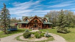 5 Bedroom 3 Bath Log Style Home On 106.83 Acres