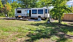 3.8 Acres Waterfront Off Grid 