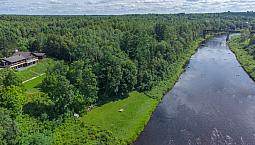 Welcome To This Waterfront Log Home Income Property!