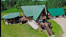 Stunning Log Home On 80 Acres