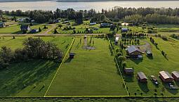 #26Im – Unreserved Real Estate Auction 1± Acre Vacant Lake Lot,