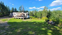 Land For Sale With Park Model Retreat  79,000