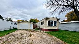  $139,000 | 2 Bedroom Home In Carman With Huge 18x30 Garage!