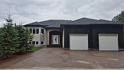 Stunning Custom-Built Built Home With Private Yard